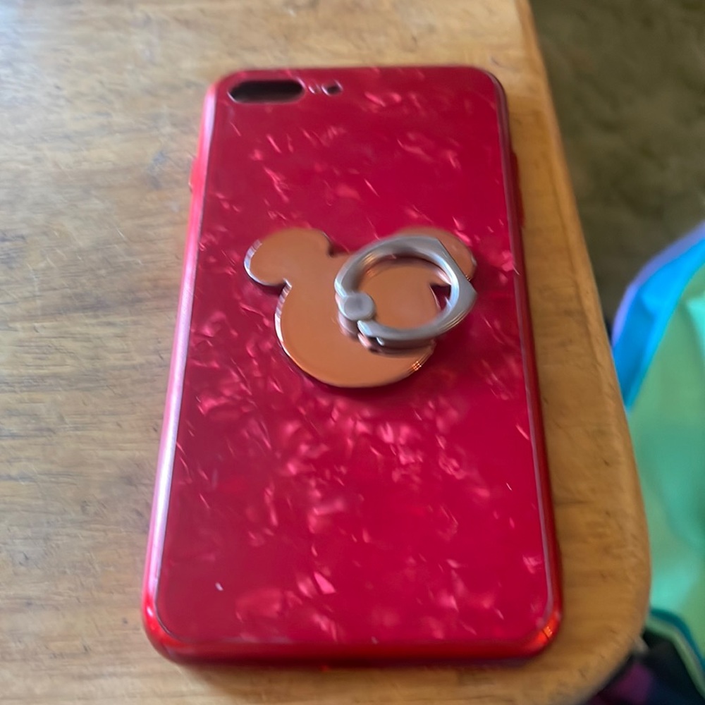 Beautiful Christmas red case. Mickey Mouse ring is removable if you don’t want.